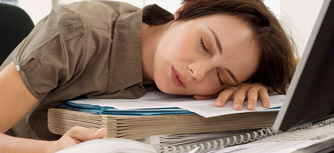 woman asleep at desk