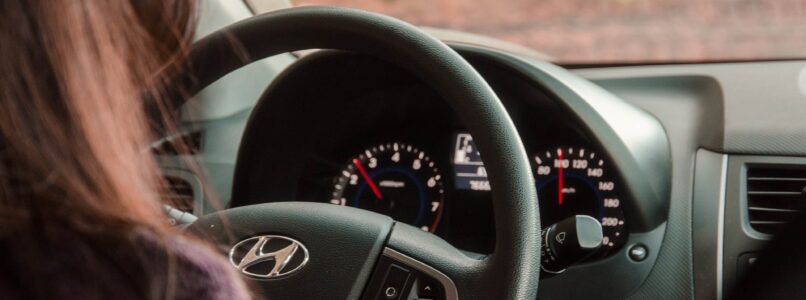 Woman driving car for ridesharing activities