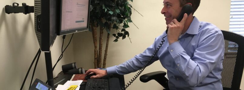 Here to help: Jordan Bradish is one of very few working in the office during the coronavirus pandemic. Almost everyone is able to work from home to stay safe.