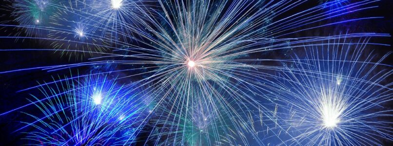 Professional fireworks display bursting in the sky. Learn safety facts to be careful with fireworks.
